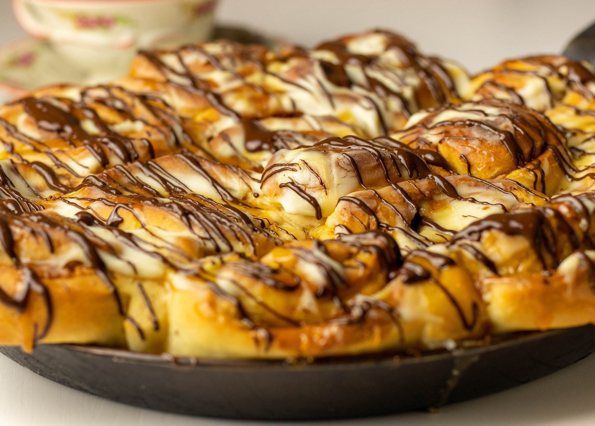 Peanut butter and salted caramel rolls with cream cheese frosting