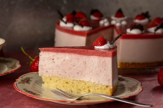 Strawberry cake with rich yoghurt cream and fruity strawberry glaze